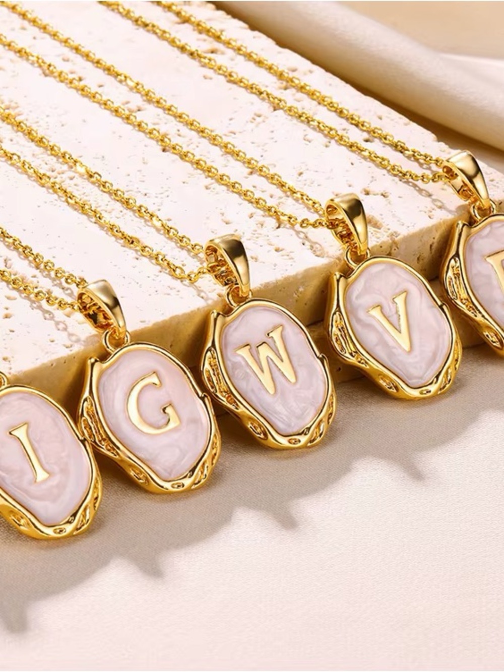 ‘Q’ Gold Plated Oceanus Oyster Shell Initial Pendant Necklace